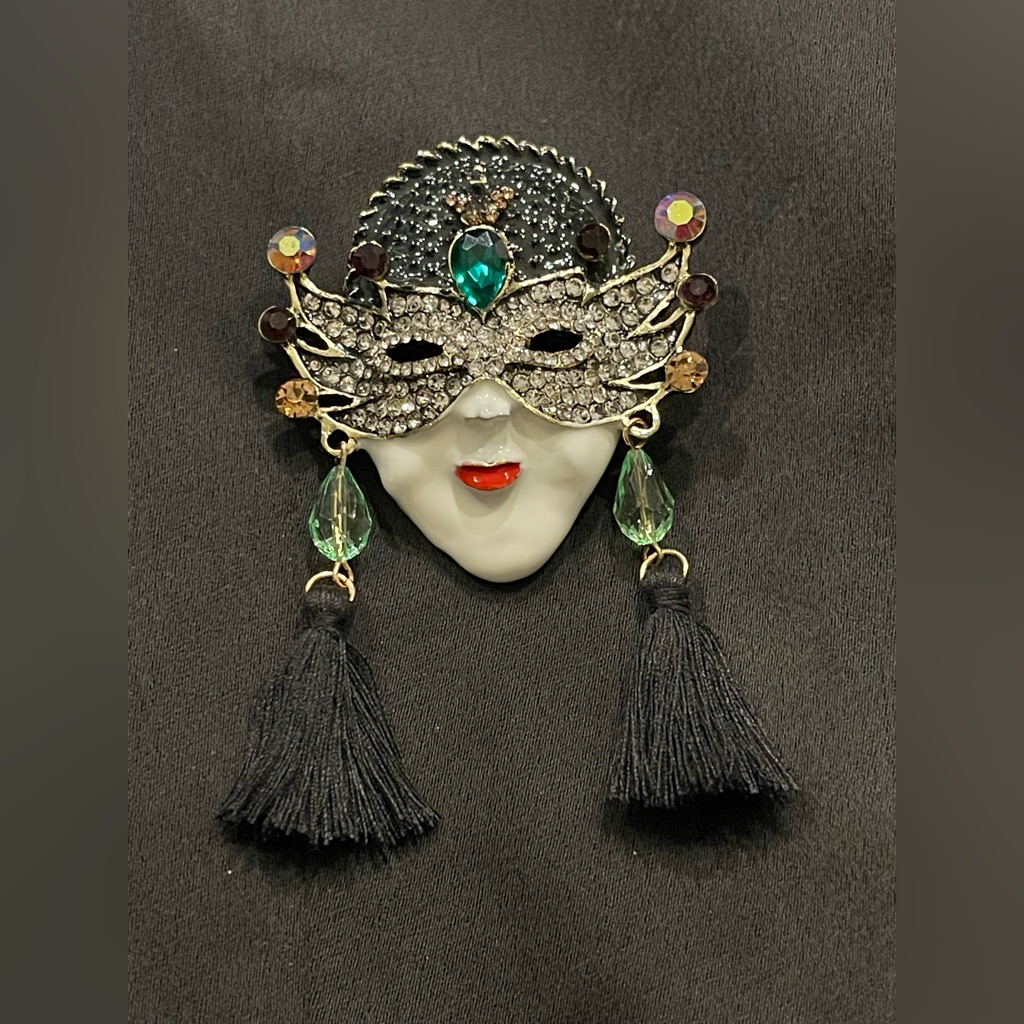 Mystical Mask Brooch With Tassels